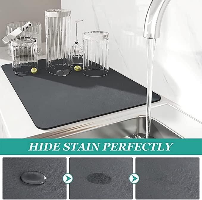 Quick-drying mat in use by sink, showcasing its stain-hiding ability and water-resistant design.